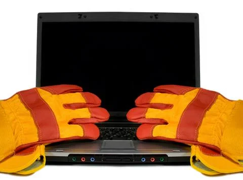 Protective gloves on a laptop isolated. empty black desktop for your text. in Stock Photos