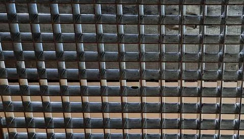 Protective grille on the ceiling of an elevator Stock Photos