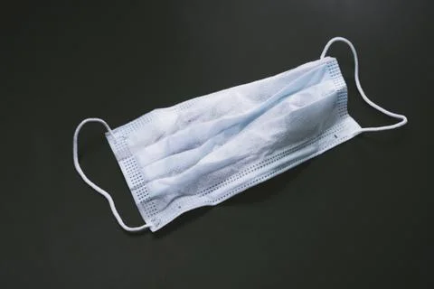 Protective mask on a black background Stock Photos