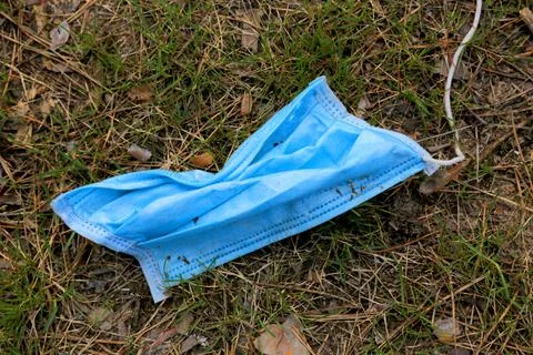 Protective mask on the grass Stock-Fotos