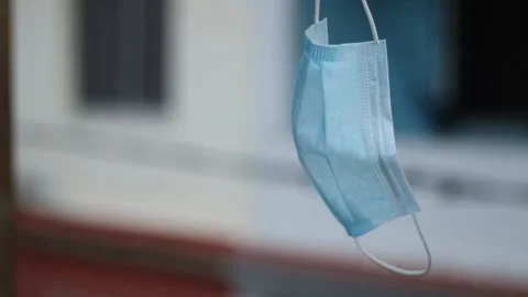 Protective mask hanging on the clothesline Stock Footage 158586550