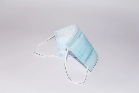 Protective mask with a light background Stock Photos