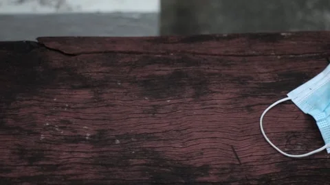 Protective mask on top of a bench Stock Footage 158586539