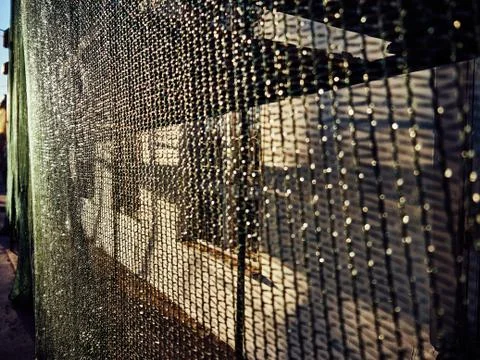 Protective mesh installed during construction work on the restoration of the  Foto stock