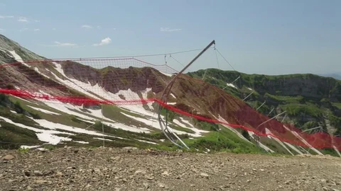 Protective mesh on the ski slopes Stock Footage