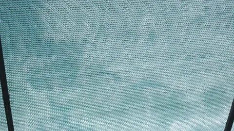 Protective net that creates shade from sun. Stock Footage 199793985