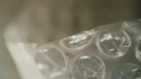 Protective packaging material for parcels and packaging of delicate fragile item Stock Footage 156213864