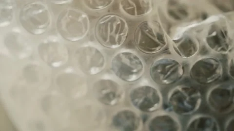 Protective packaging material for parcels and packaging of delicate fragile item Stock Footage 156214030