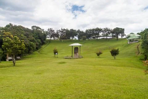 Protective roofs over statues located at Alto de los Idolos site near San Agu Stock Photos