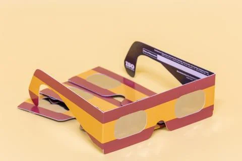 Protective solar eclipse viewing glasses for celestial event Stock Photos