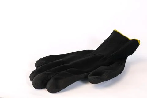 Protective work glove isolated on white background. Stock Photos