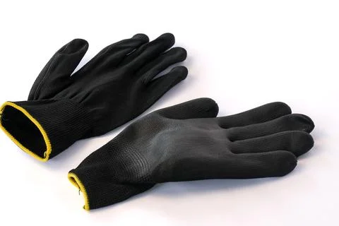 Protective work gloves isolated on white background. Stock Photos