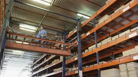 Protective Workwear, Indoors, Day, Working, Manual Worker, Industry, Warehouse, Stock Footage 94049672