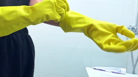 Protective Yellow Cleaning Gloves Designed Specifically for Household Stock Footage 282652395