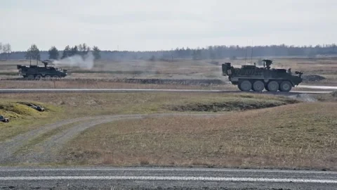 Protector RWS Live Fire - M1126 Stryker and Cougar MRAP (28) Stock Footage 162253328