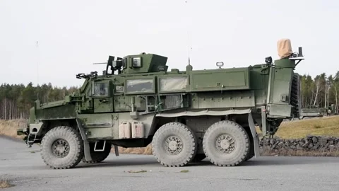 Protector RWS Live Fire - M1126 Stryker and Cougar MRAP (20) Stock Footage 162253797