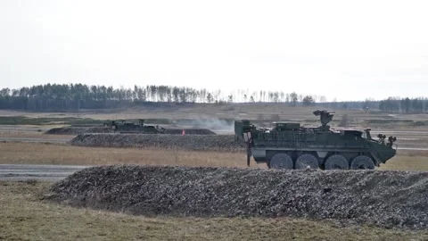 Protector RWS Live Fire - M1126 Stryker and Cougar MRAP (27) Stock Footage 162253892
