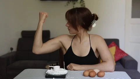 Protein supplements help support daily protein intake and muscle growth Video stock 339800036