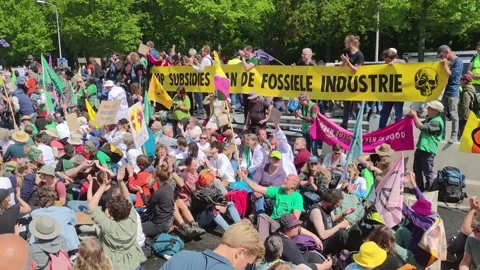 Protest action of climate activists in The Hague, road blockade 스톡 동영상 242279157