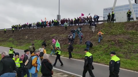 Protest action of Extinction Rebellion activists at A10 highway in Amsterdam 動画素材 272444655
