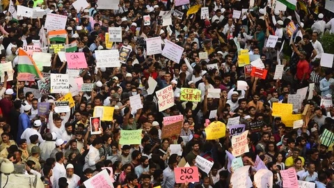Protest against CAA and NRC Stock Footage 121637539