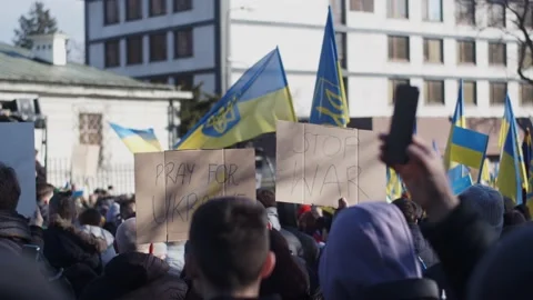 Protest Against The Russian War In Ukraine. Ukrainian Flag, Protesters Stock Footage 171107732