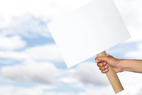 Protest banner on cloudy sky background Stock Photos