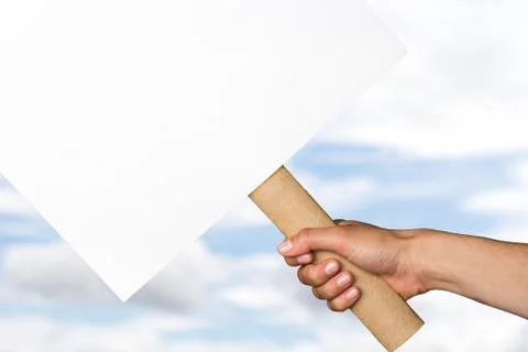 Protest banner on cloudy sky background Stock Photos