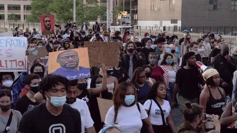 Protest BLM crossing Brooklyn bridge ,against police brutality, violence  Stock Footage