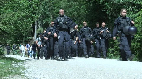 Protest climb in Alps towards Schloss Elmau Stock Footage 51045375