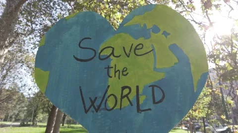 Protest demonstration and flash mob  with Save the Planet in a park with Green n Stock Footage 290506542