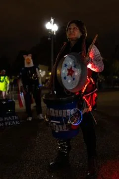 Protest Drummer at Night with lights Stock Photos