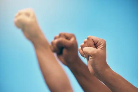 Protest group, hands in air and fist of people for solidarity, equality and Stock Photos