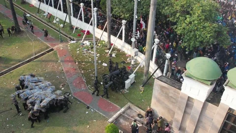 PROTEST AT INDONESIAN PARLEMENT BECAUSE SUDDENLY CHANGES OF ELECTION LAW Stock Footage 282574335