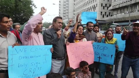 Protest in Karachi against the burning of several churches in northeast Pakistan Stock Footage 248085589