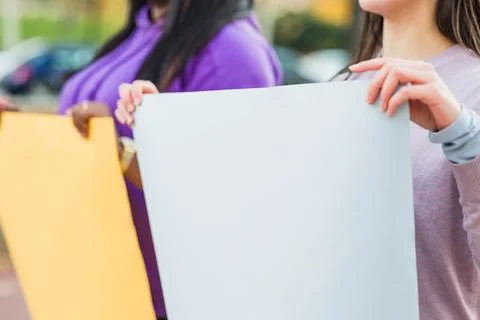 Protest march or strike holding blank board outdoors. Activist social and Stock Photos