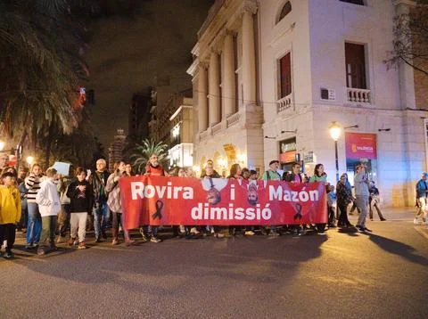 Protest march in Valencia with a large red banner Stock Photos