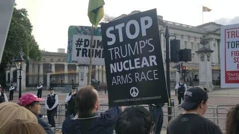 Protest Placards saying DUMP TRUMP at British Rally during Queen Visit 4K Stock Footage 109205192
