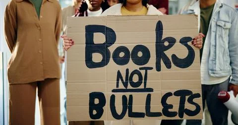 Protest, poster and support with students or activist for school shooting 库存照片