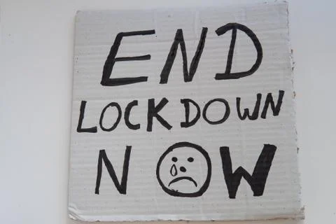 Protest poster with words 'End Lockdown Now'. Anti lockdown banner. Covid 19 Stock Photos