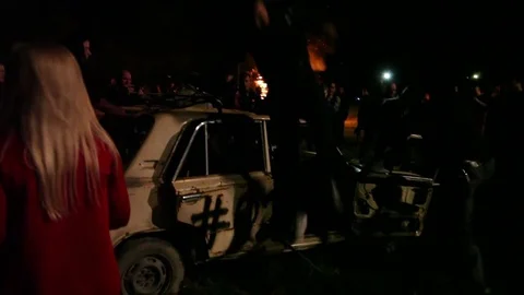 Protest, Riot, Demonstration In The City, Fire. People Break The Car. Sabotage Stock Footage 82171774
