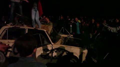 Protest, Riot, Demonstration In The City, Fire. People Break The Car. Sabotage Stock Footage 82171789