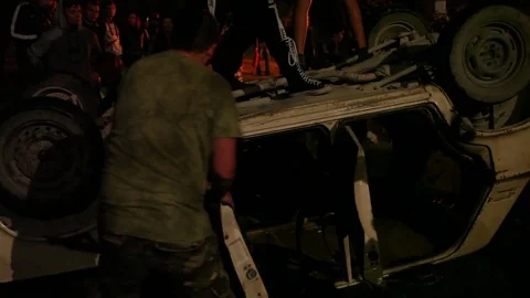 Protest, Riot, Demonstration In The City, Fire. People Break The Car. Sabotage Stock Footage 82171852