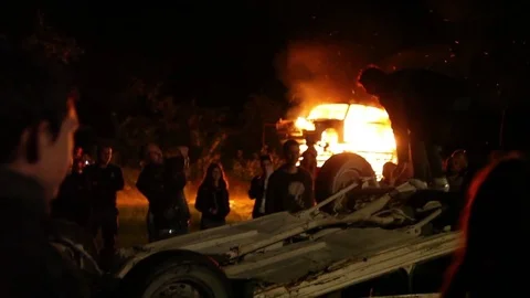 Protest, Riot, Demonstration In The City, Fire. People Break The Car. Sabotage Stock Footage 82171857