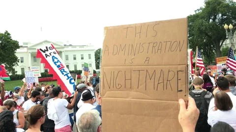 Protest Sign "This Administration Nightmare" at White House Stock Footage 79730117