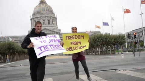 Protest sign freedom from delusion and its time to speak the truth. Stock Footage 124445772
