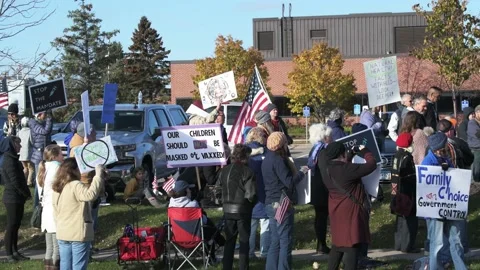 Protest to stop masking and vaxing the children Video stock 164818506