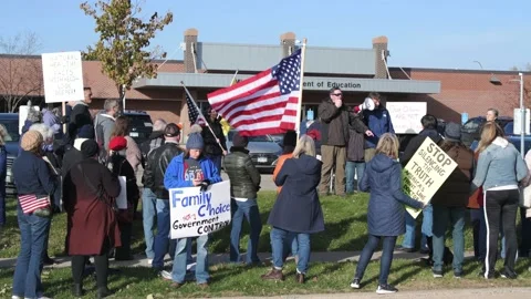 Protest to stop masking and vaxing the children Video stock 164819843