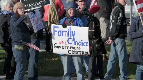Protest to stop masking and vaxing the children Video stock 164880946
