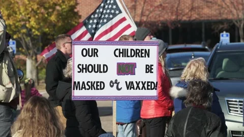 Protest to stop masking and vaxing the children Video stock 164882699